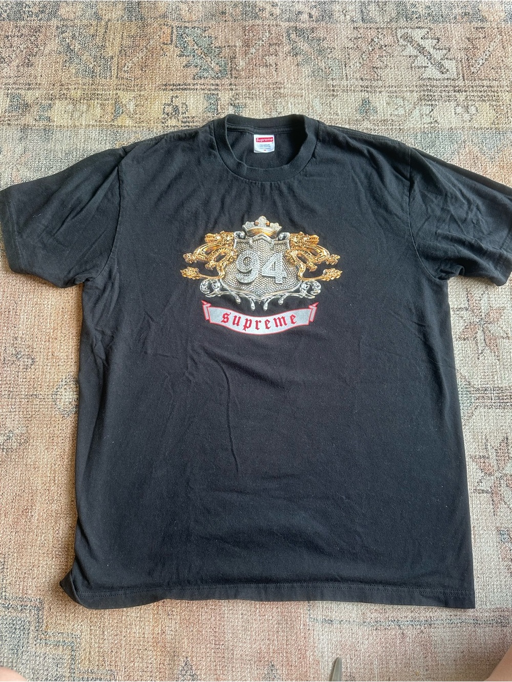 Supreme Black Tee with Gold & Silver '94 Crest and Red Banner